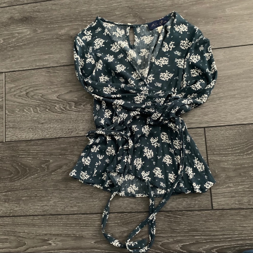 Floral cross over front tied long sleeve blouse